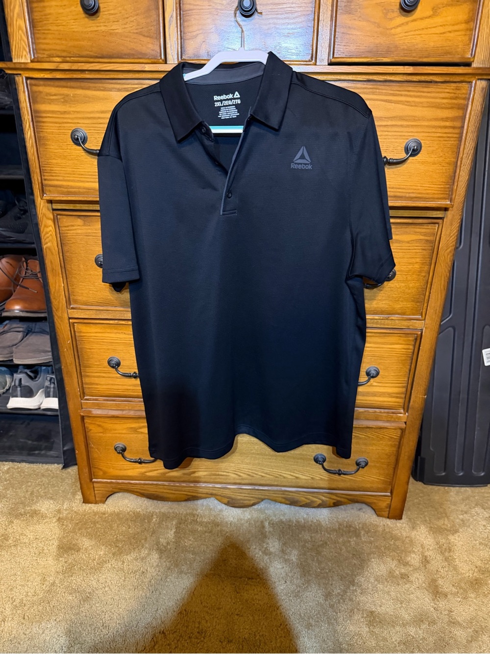 Reebok Men’s Black Polo Shirt with Subtle Logo